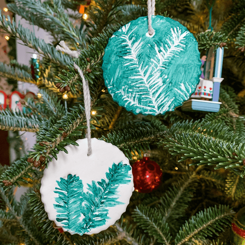 Have some extra Model Magic clay left over from a past Knowledge Crate? Use it to create a sweet Christmas tree keepsake ornament with your kiddos!