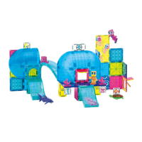 A colorful transparent plastic building toy set arranged into an underwater-themed play structure, featuring translucent blue domes, slides, walls, and small toy figures and sea-themed accessories on a plain white background.